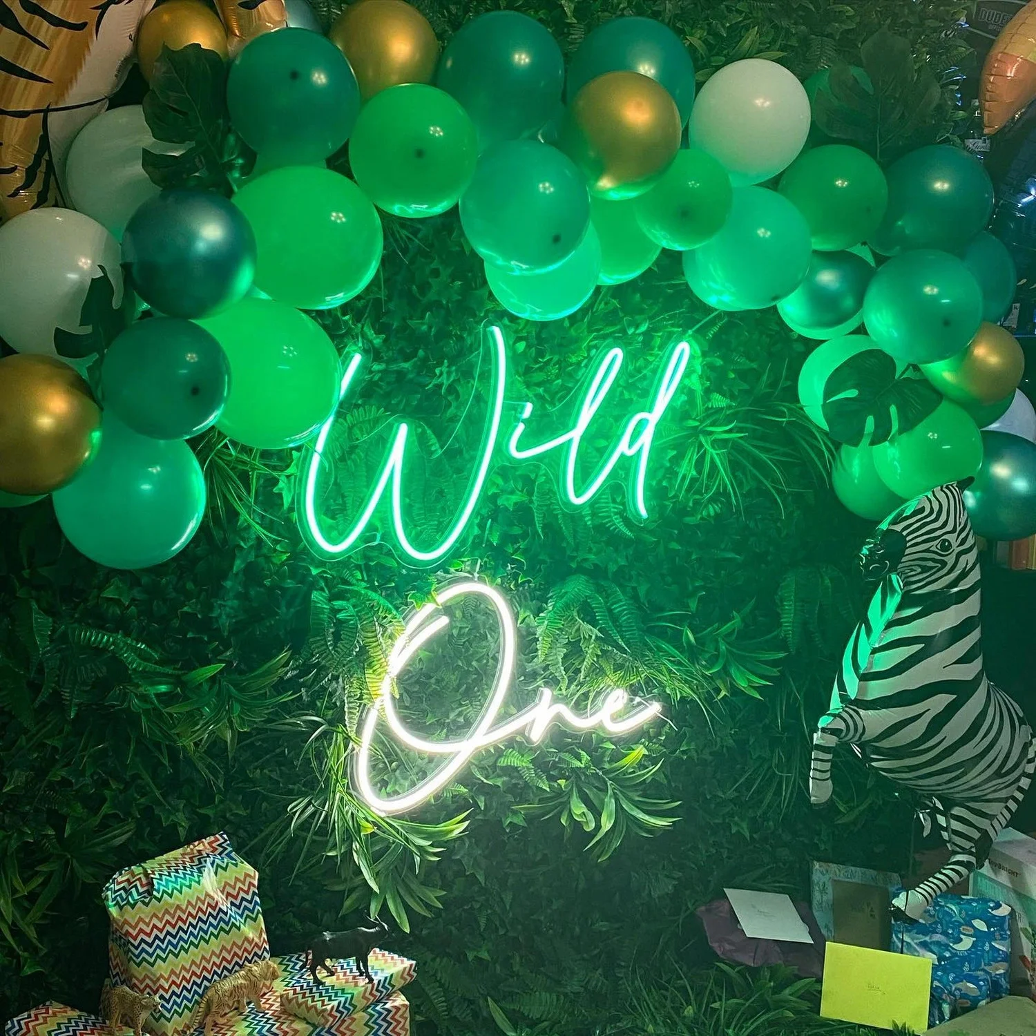 Custom Neon Signs Mounted on Faux Flower Walls